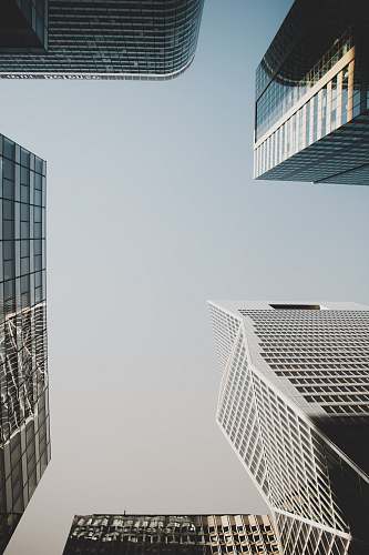 office building low angle photography of concrete buildings grey